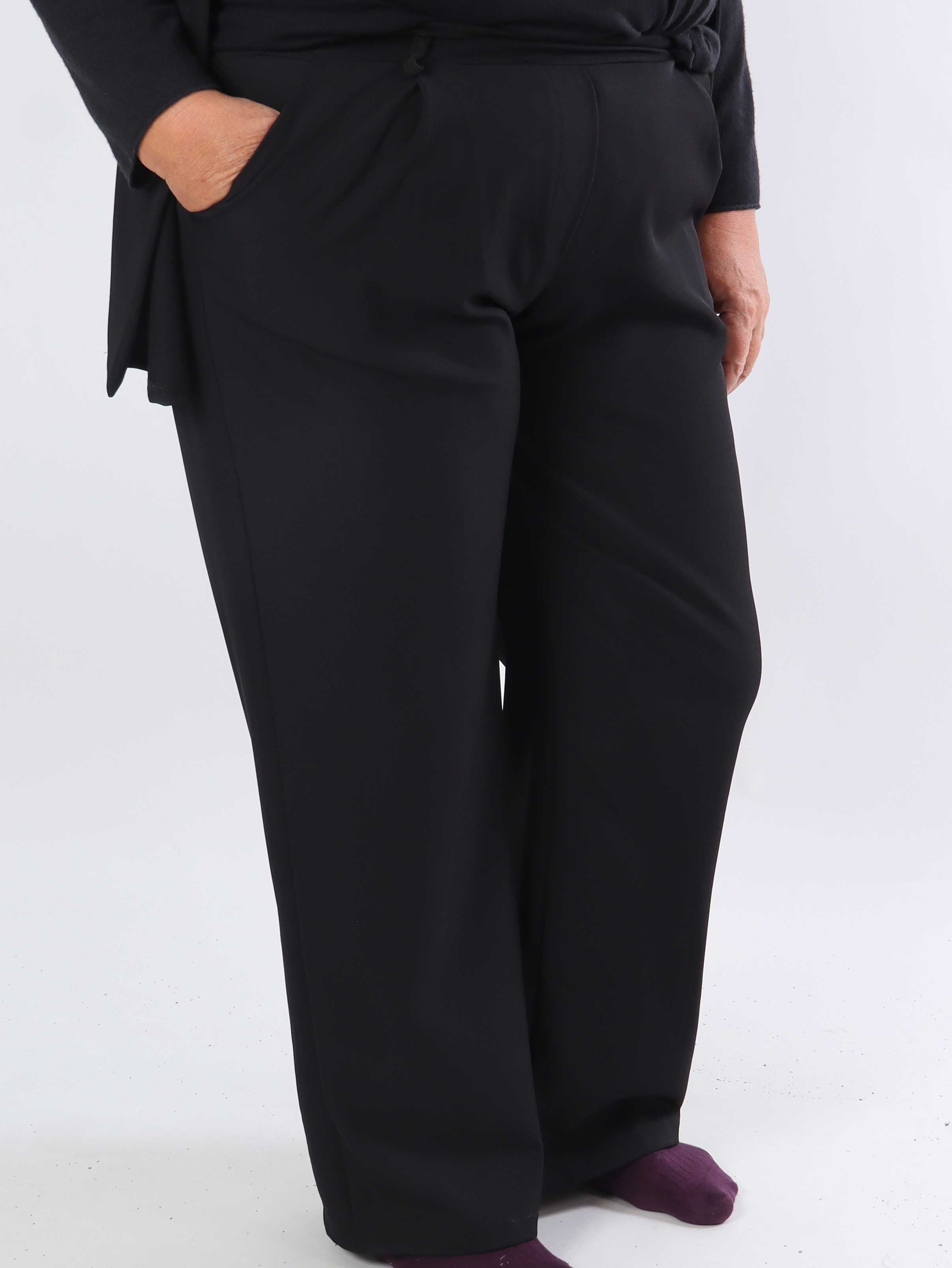 Shadia Pants - Enfärgade kostymbyxor med resår i ryggen